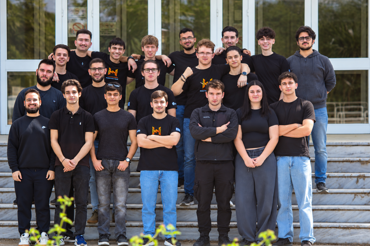 The HEPHAESTUS team in front of the university building